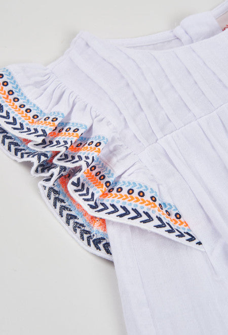 Blusón de tejido fantasía de niña