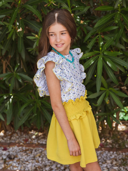 Conjunto Sardines camisa estampada volante manga y falda lima engomada - Eve Children